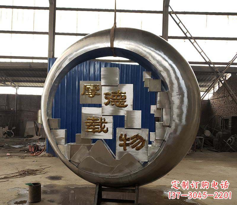鹤壁不锈钢圆环景观雕塑环绕着美丽