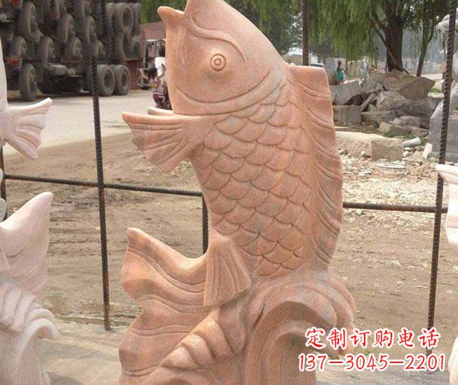 鹤壁公园景观晚霞红石雕鱼喷泉