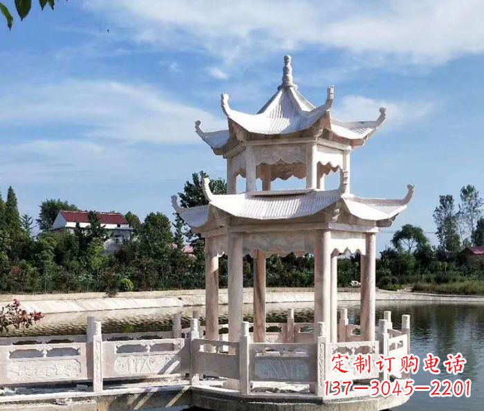 鹤壁海边景观晚霞红石雕凉亭