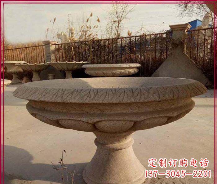 鹤壁黄锈石花盆雕塑,让花园更加美丽