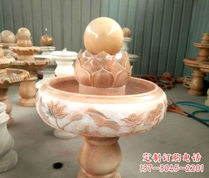鹤壁石来运转晚霞红风水球喷泉石雕