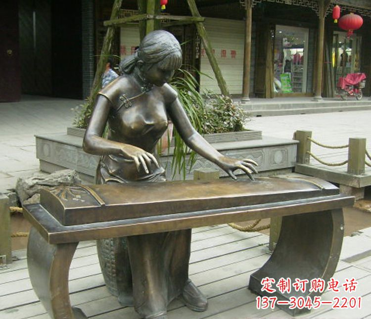 鹤壁铜雕现代人物弹古筝雕塑
