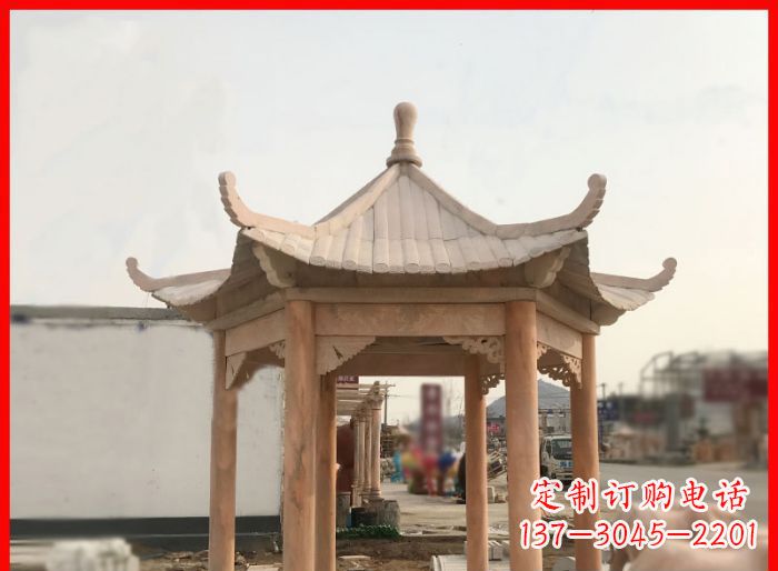 鹤壁晚霞红公园六角石雕凉亭