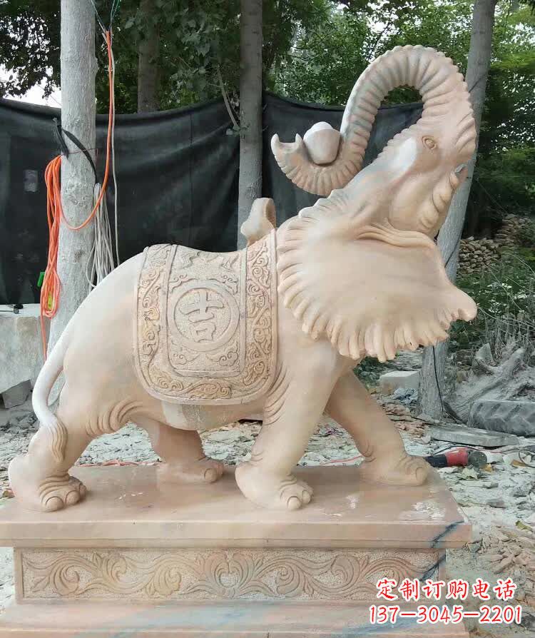 鹤壁晚霞红卷元宝大象雕塑