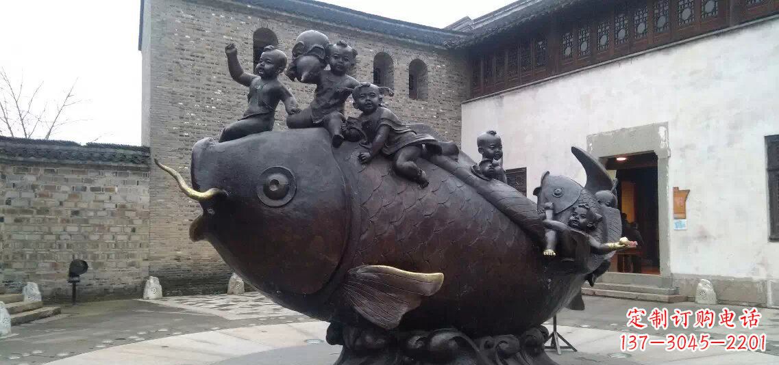 鹤壁小孩骑鱼铜雕