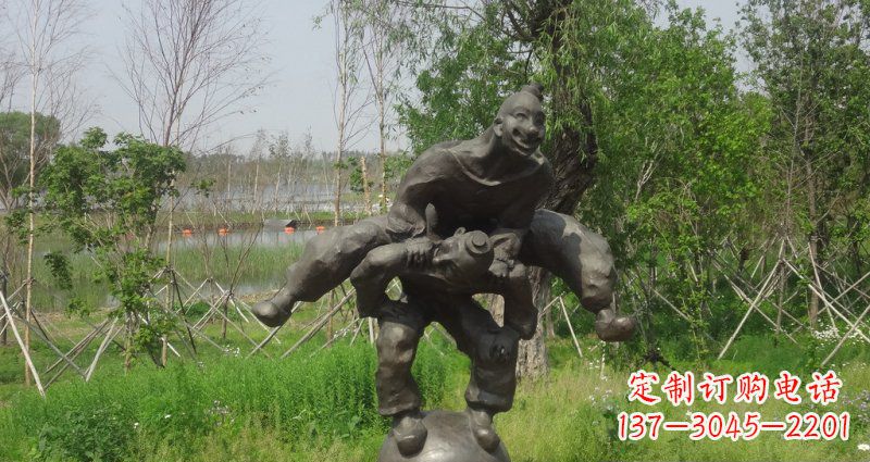 鹤壁园林站在球上面跳山羊的人物景观铜雕